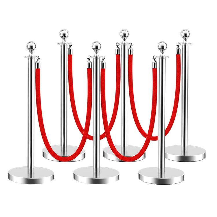 Silver stanchion posts with red velvet rope barrier